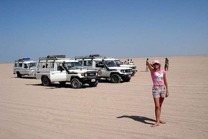 Jeep 4x4 driving through Hurghada desert dunes during Bedouin Safari tour