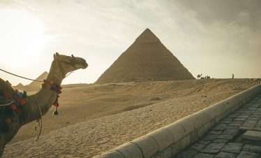 he Giza Pyramids and the Sphinx in Cairo, Egypt.