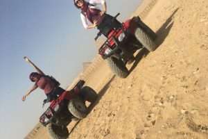 ATV quad bike safari near Giza Pyramids in Cairo desert.