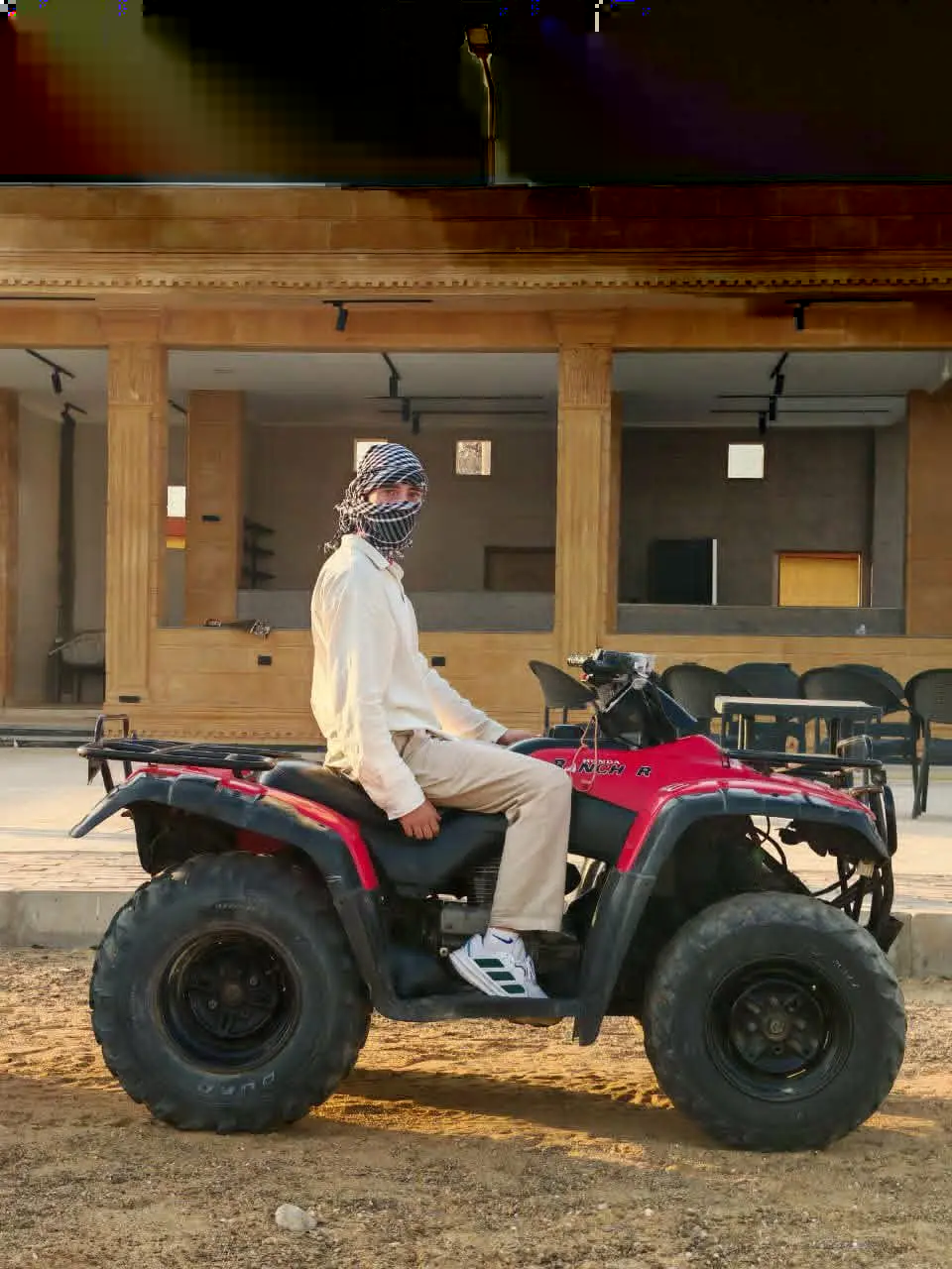 Giza Pyramids quad bike tour with ATV rider exploring the desert landscape