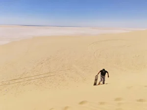  Fayoum sand boarding adventure on golden dunes in Wadi El Rayan desert near Cairo Egypt