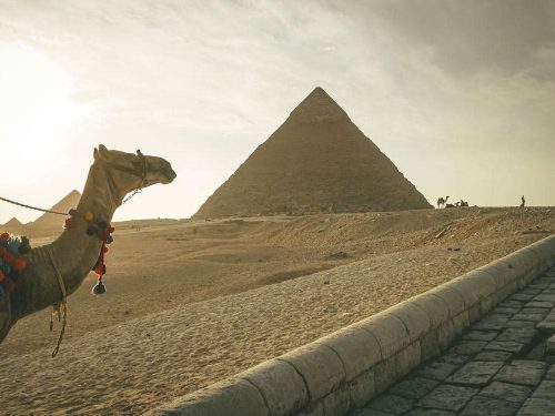 he Giza Pyramids and the Sphinx in Cairo, Egypt.