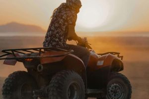 "Sunrise quad bike safari in Luxor desert with view of temples and Nile"